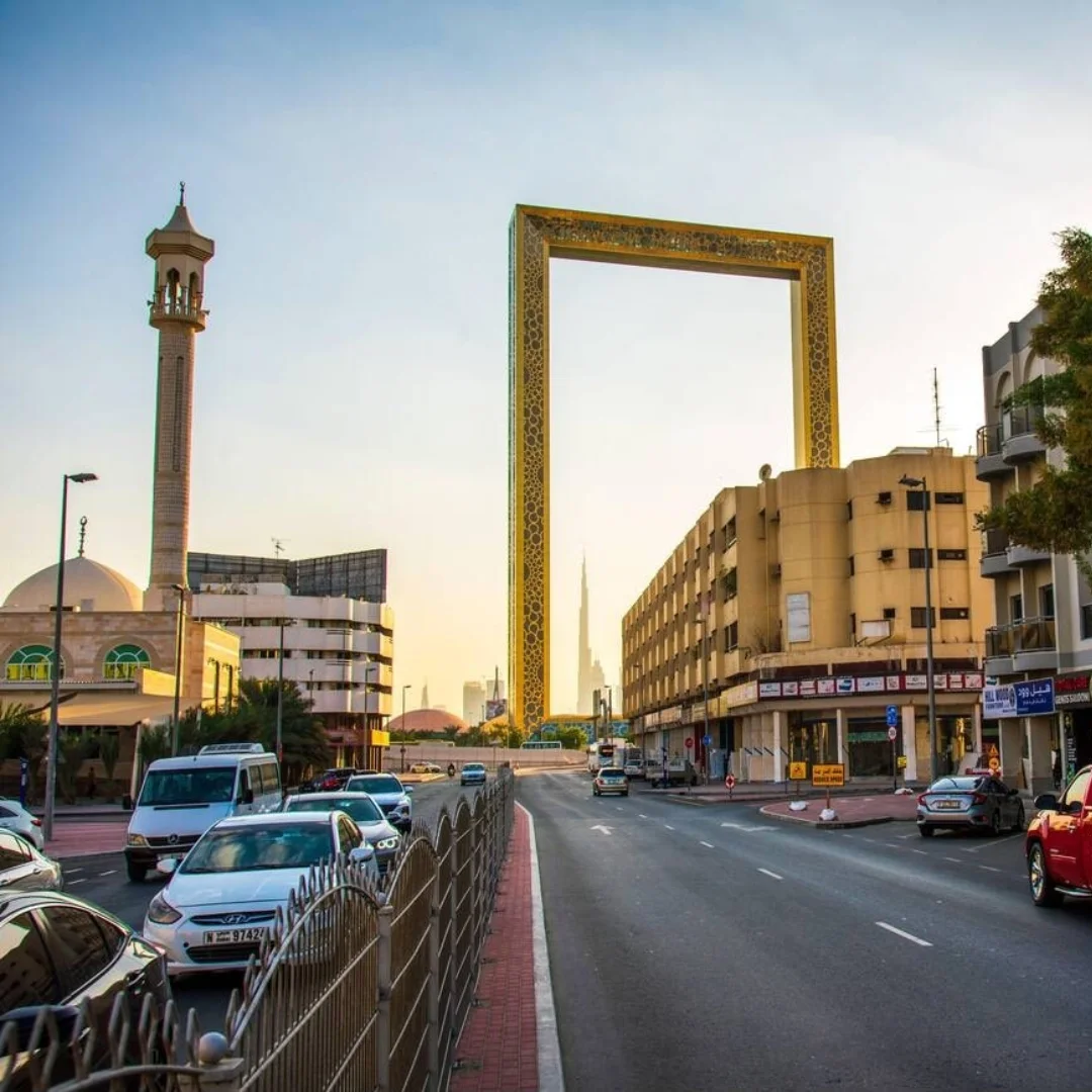 picture showing buildings in Al Karama Road and cars also area