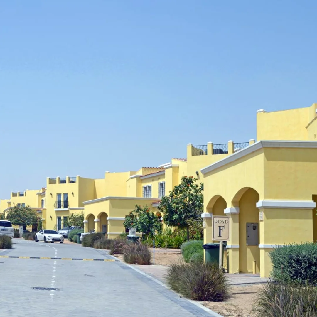 picture showing village and luxury villas also car in al waha area