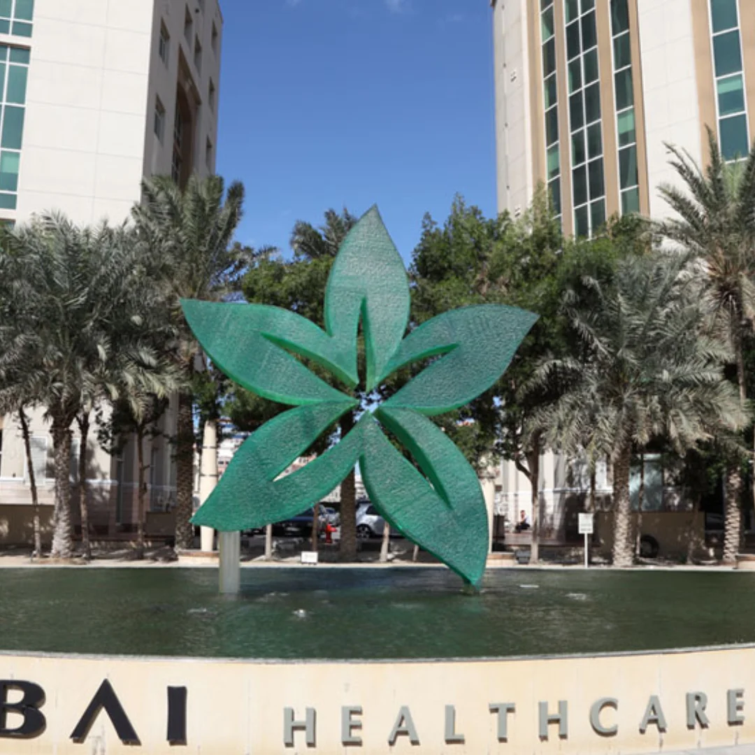 picture showing logo and statue of dubai healthcare city 