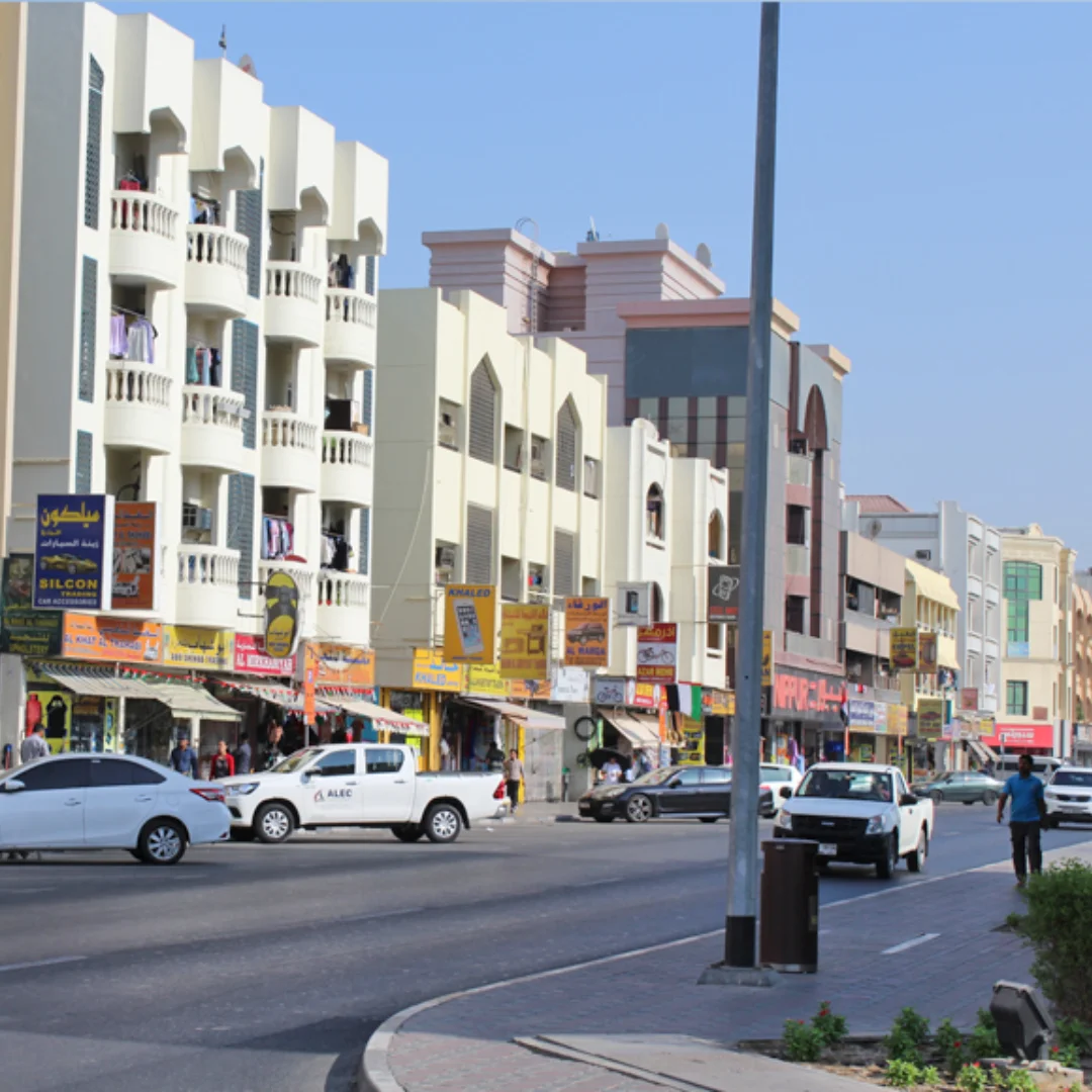 picture showing building also roads and cars moving person in al satwa area